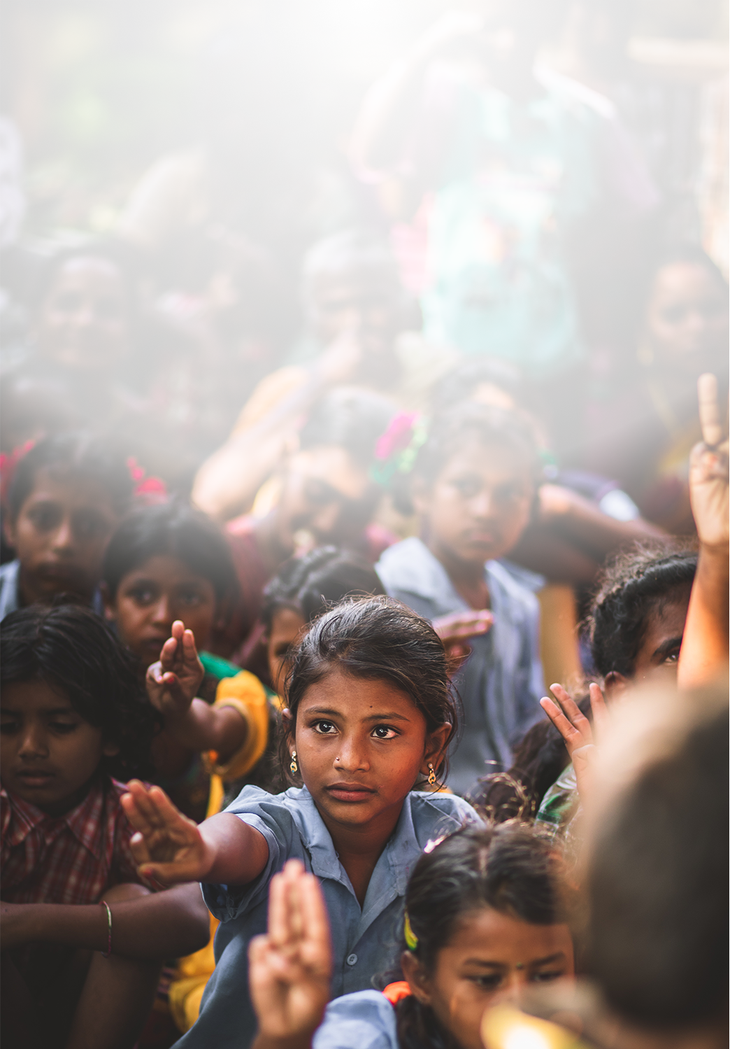 Female individual standing out in a crowd